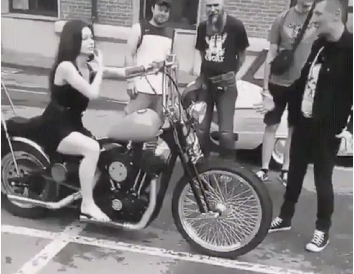 Girl riding clearance motorcycle in skirt